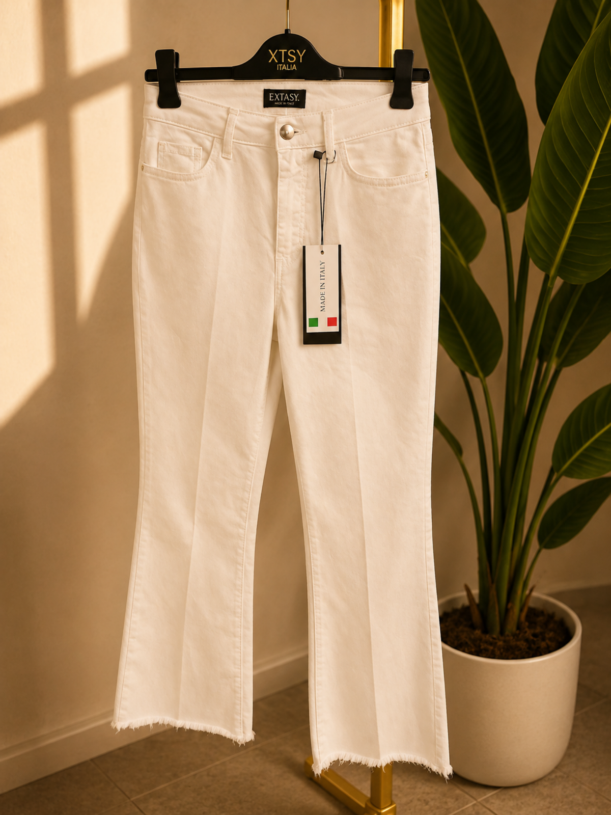 Pantalone a zampa in cotone 5 tasche